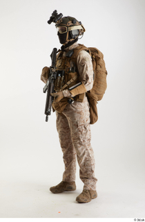 Photos Casye Schneider Paratrooper holding gun standing whole body 0002.jpg